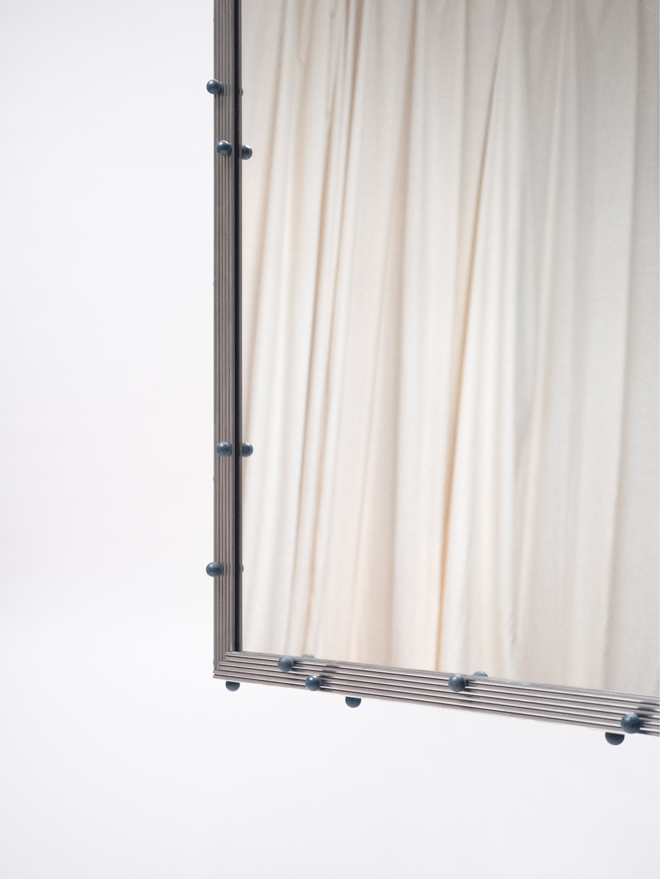 Inox & Florite Mirror
by McKeever Donovan