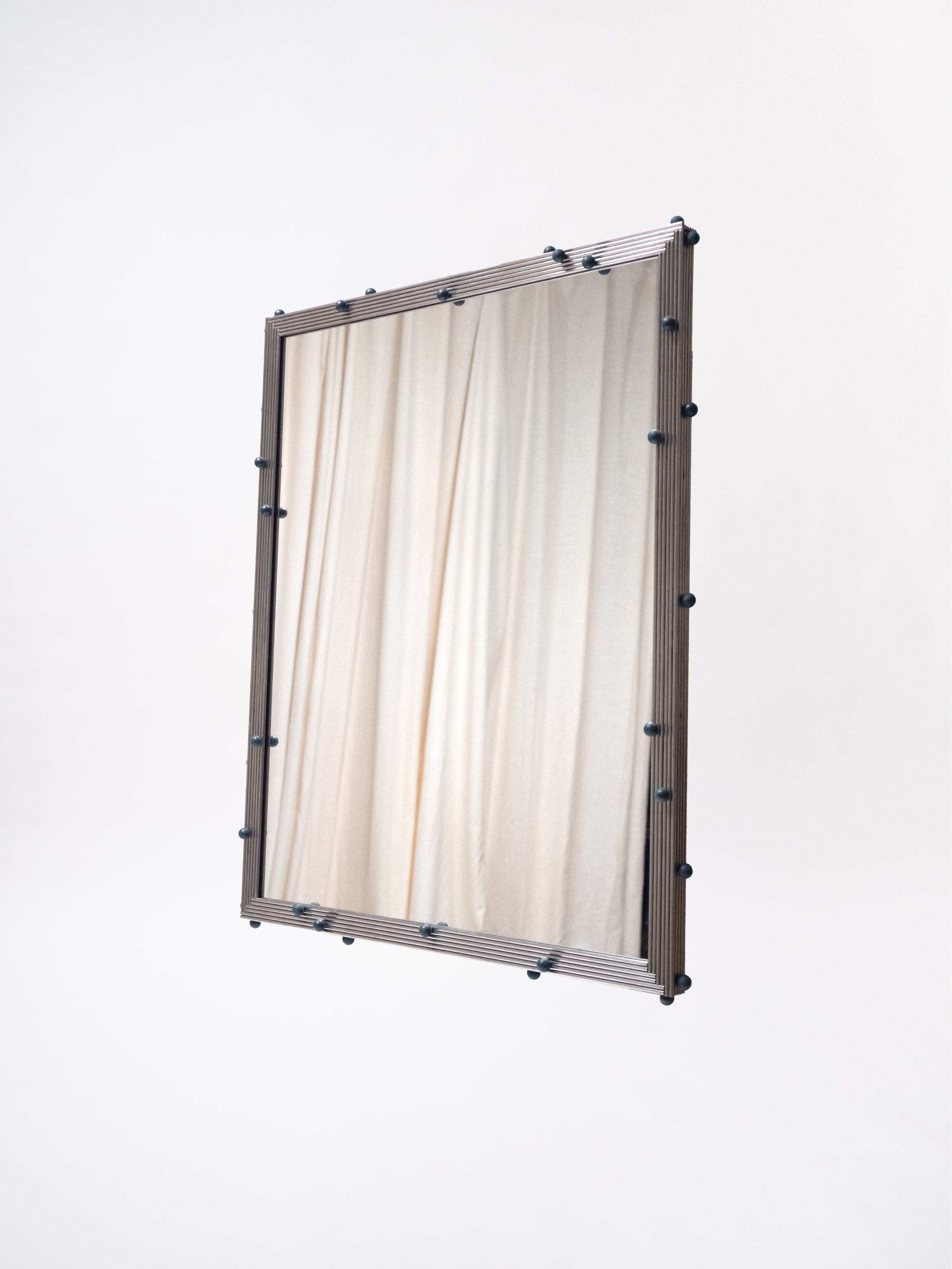 Inox & Florite Mirror
by McKeever Donovan